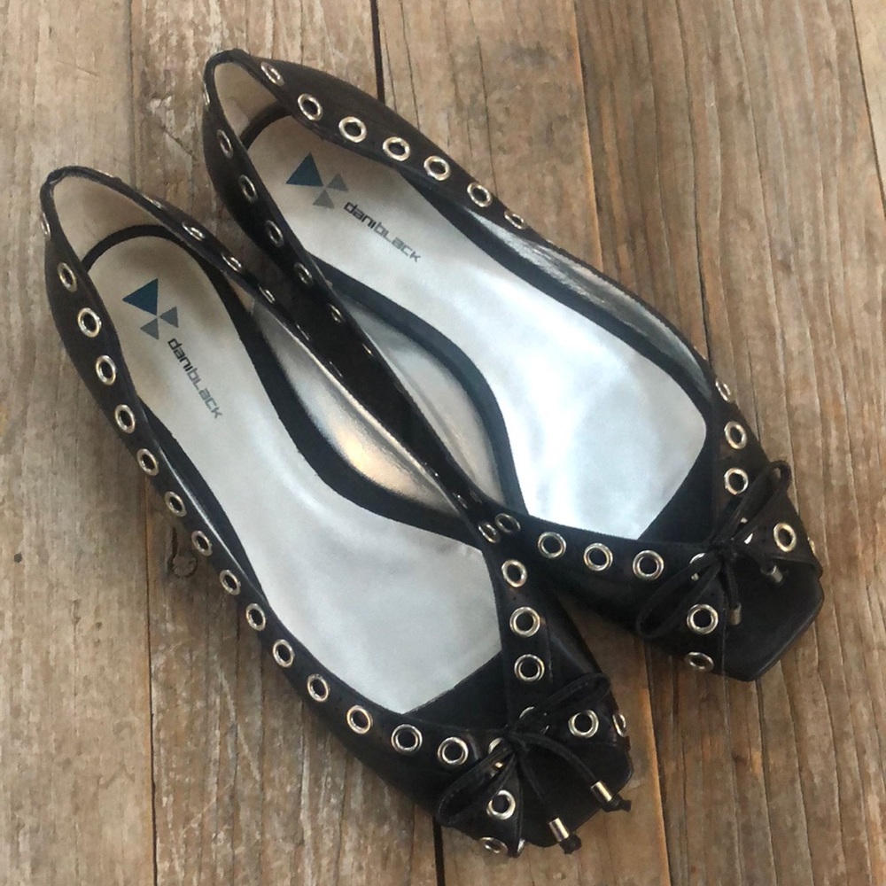 Size 10 black peep, toe flat with silver grommet details and bow